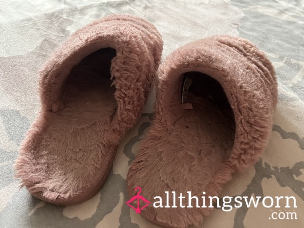 Old Worn Furry Slippers With The Scent Of Feet