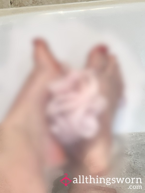 Painted Toes Playing With Loofah In The Bath
