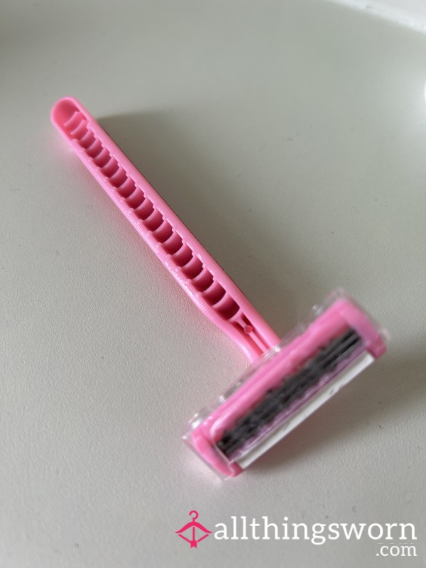 Pink Razor Used For A Full Shave After A Week Of Not.