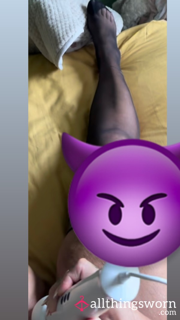 Playing With Toy In Black Stockings