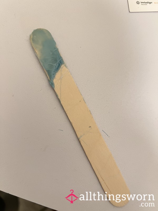 Popsicle Stick Used To Apply Wax Onto…