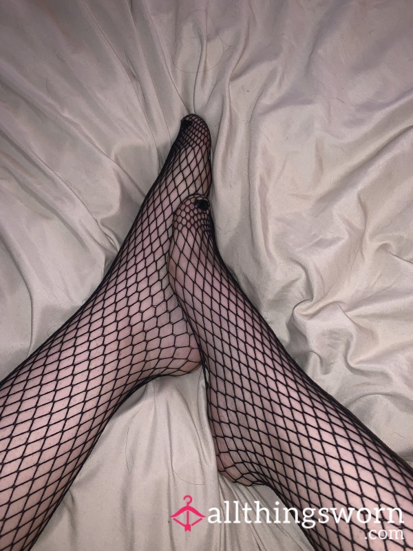 Pretty Little Feet In Fishnets