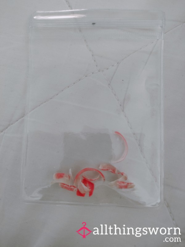 Pretty Red Toenail Clippings