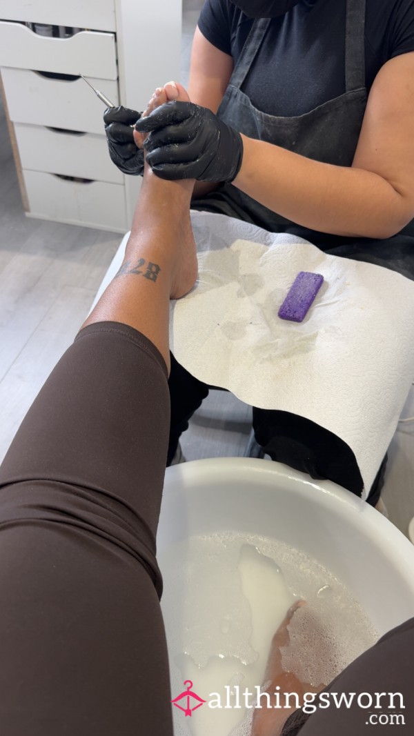 Receiving A Pedicure