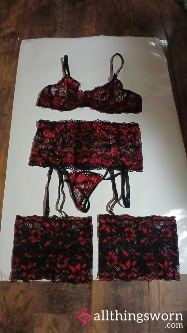 Red And Black Outfit With Leg Cuffs