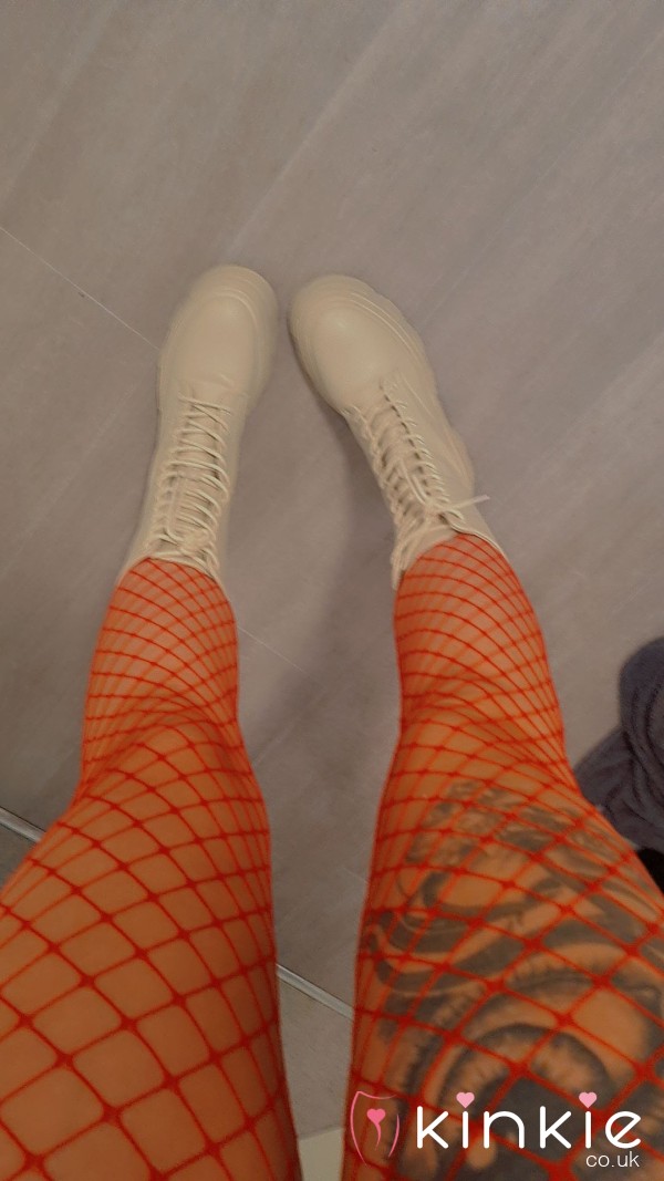 Red Fishnet Tights Worn With No Panties