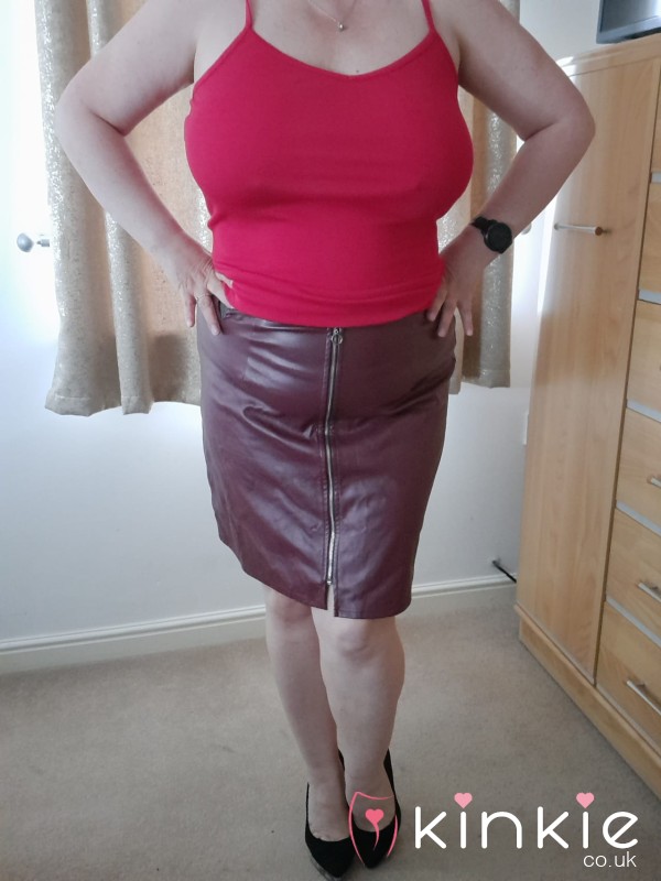 Red Vest And Pvc Skirt