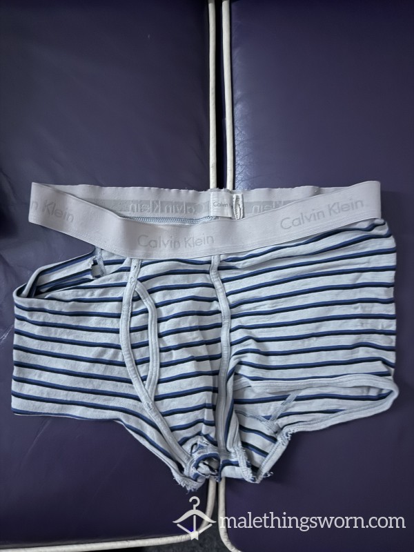 Ripped Calvin Kleins