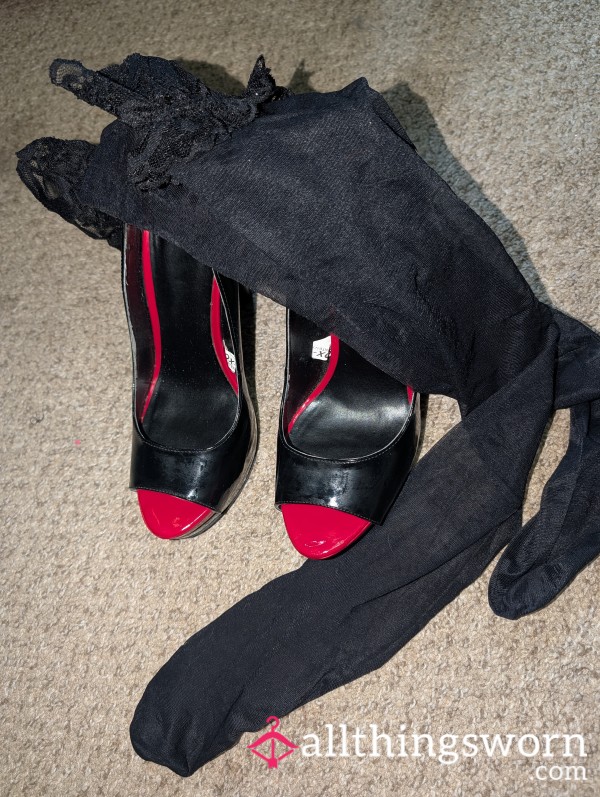 S**y Legs In Black Stockings And Shiny Black Stiletto Heels With A Red Toe
