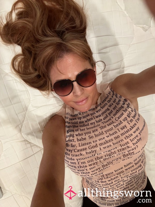 Sheer See Through Modern Sleeveless S**y Top With Writings On It. Very S**y. Used For Fans Page