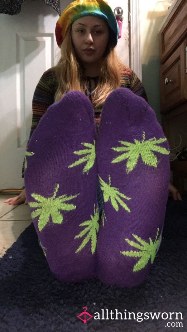 Size 11 Feet Wearing Purple And Green Stoner Socks