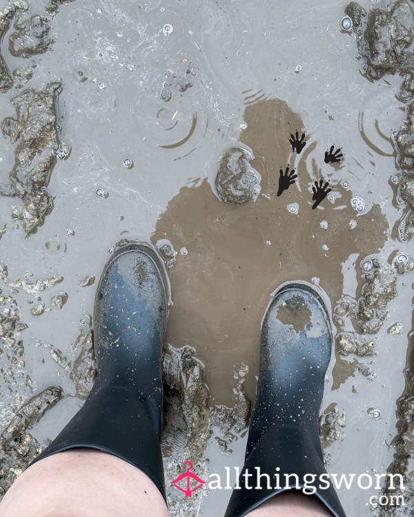 Size 8 Feet In Rubber Boots And Bare Feet Stomping In Mud In The Rain
