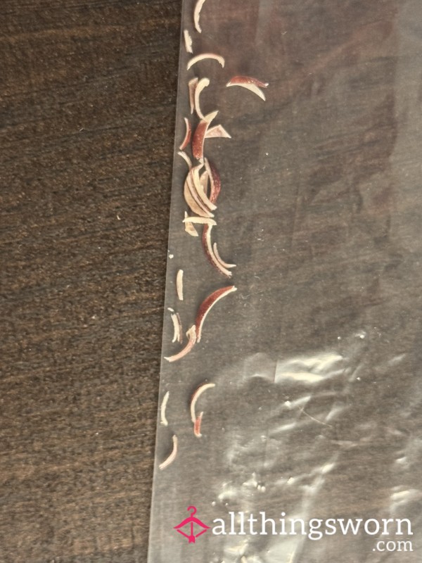 Sparkly Maroon Toenail Clippings