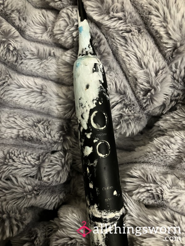 Sp*ttle Covered Electric Toothbrush
