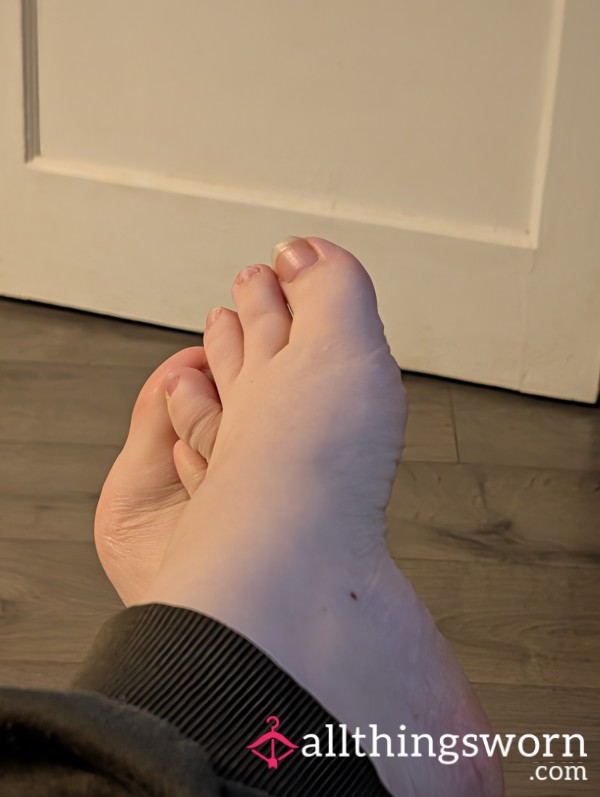 Spread Toes, Soles And Used Slippers.