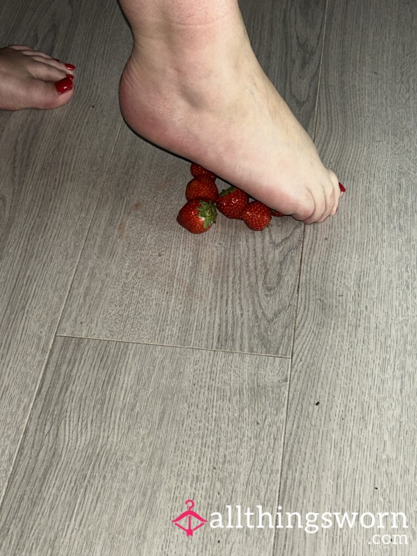 Stepping On And Crushing Strawberries With Bare Feet