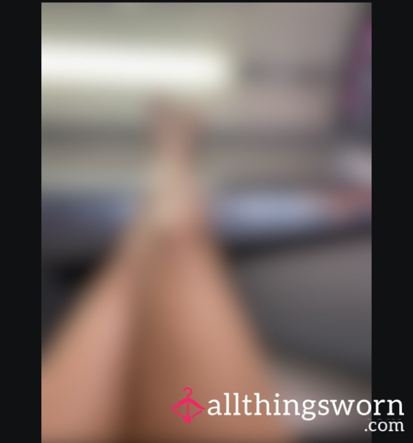 Suntanned Legs Against Sun Bed