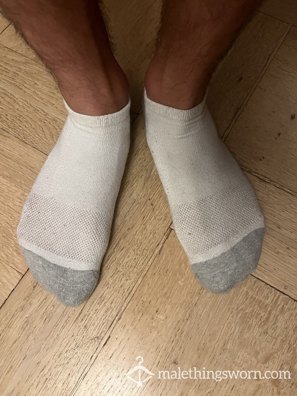 Sweaty And Worn White Pair Of Socks