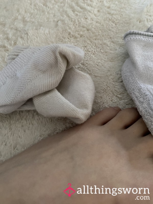 Taking Socks Off And Rubbing My Feet After A Day Of Cleaning