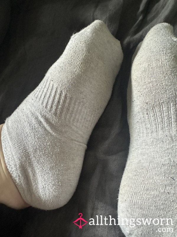 Taking Socks Off To Show Feet