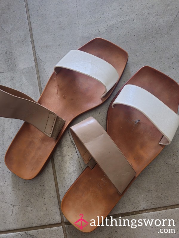 Tan And White Well Worn Slides