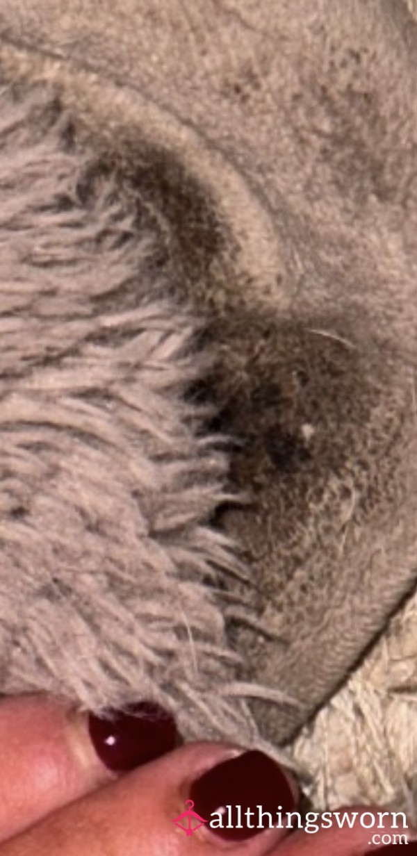 Tanned Feet In Well Worn Slippers