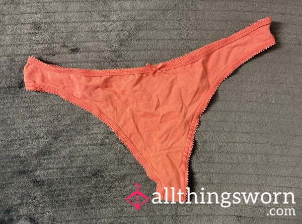Tiny Cor*l Orange Scalloped Edge Thong With Bow