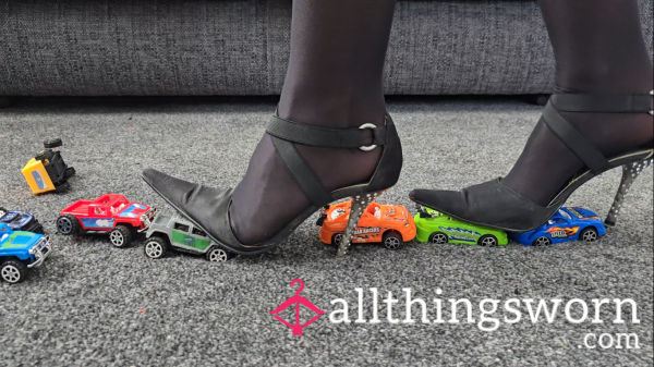 Toy Car Crushing Customs Under S**y Heels