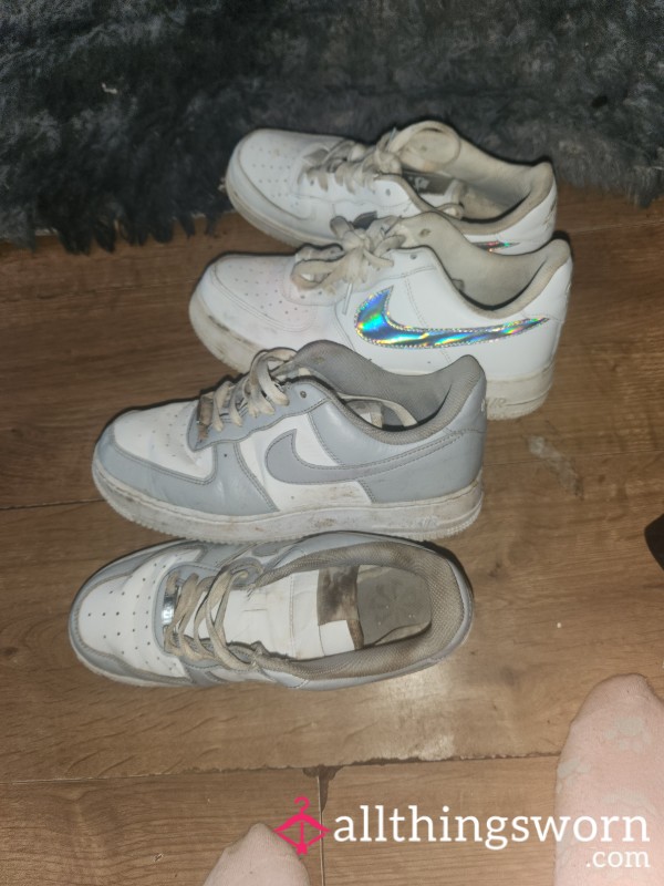 Two Pairs Of Nike Trainers