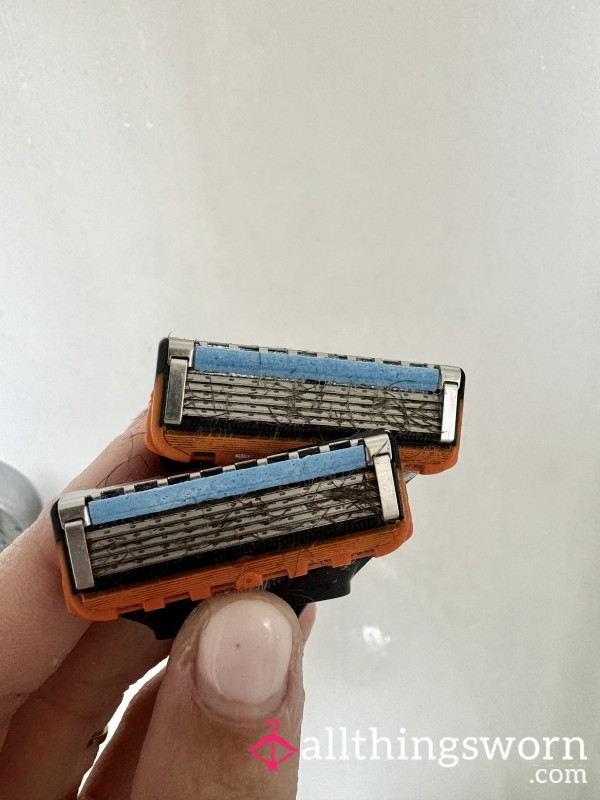 TWO USED RAZOR HEADS🪒