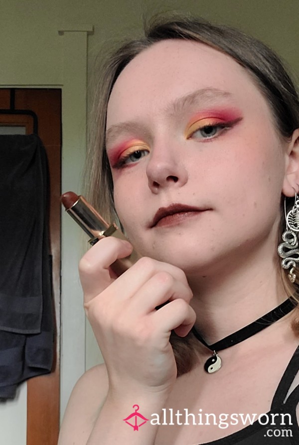 Used Dark Brown Lipstick