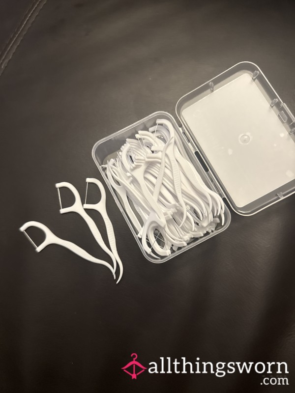 Used Dental Floss Sticks