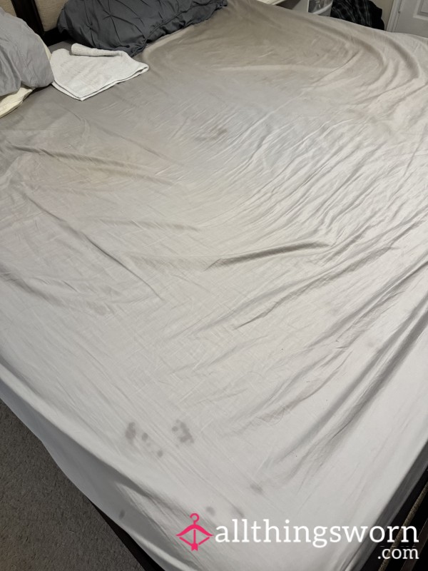 Used, Dirty, Stained, And Old King Size Grey Fitted Bed Sheet