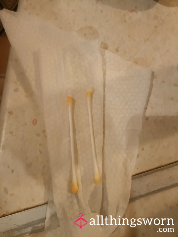 Used Ear Buds & Face Wipe
