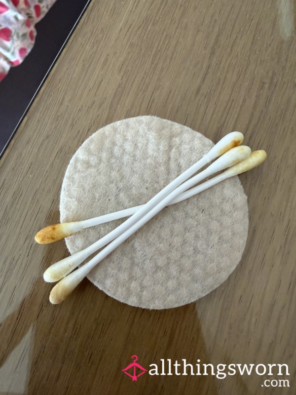 Used Face Pad And Waxy Ear Buds