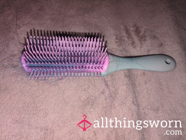 Used Small Hair Brush With Blue Hair Attached