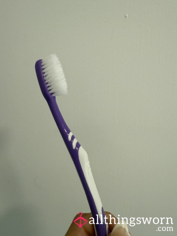 Used Hard Bristle Toothbrush
