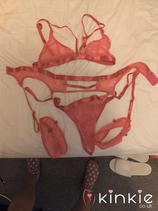 Used Pink Lingerie With Belt And Odd Stockings