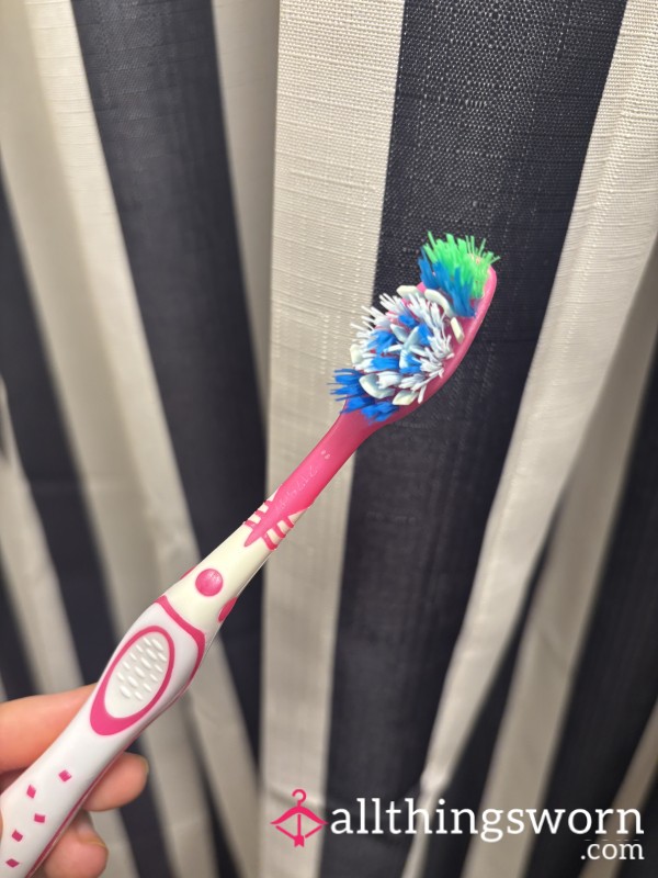Used Pink Tooth Brush