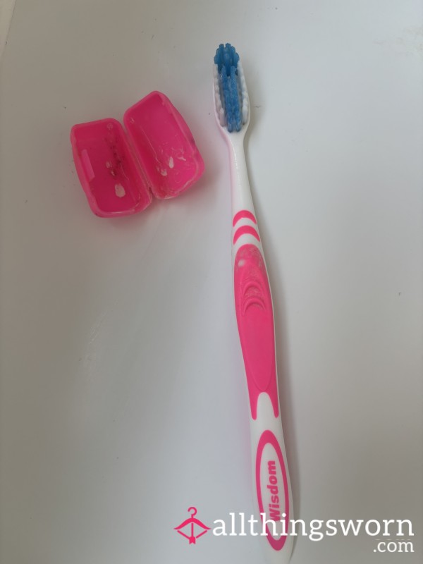 Used Pink Toothbrush
