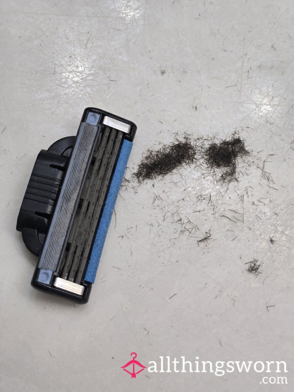 Used Razor And Shaved Leg Hair