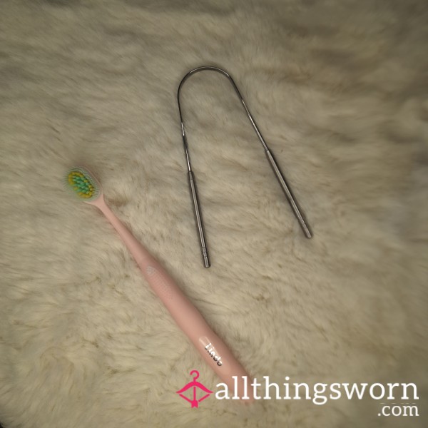 Used Toothbrush And Tongue Scraper