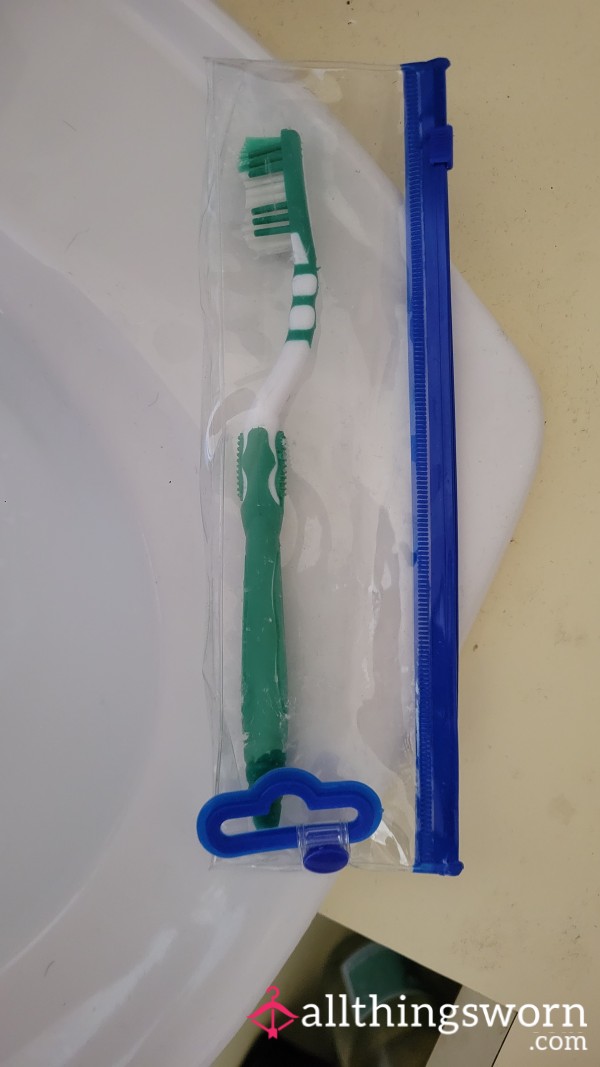Used Travel Toothbrush