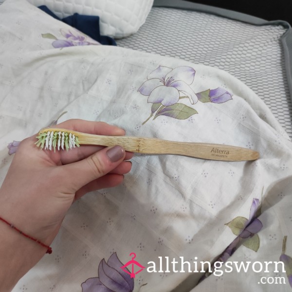 Used Wooden Toothbrush