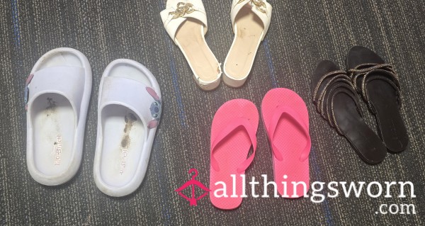 Variety Of Well Worn Slide Sandals