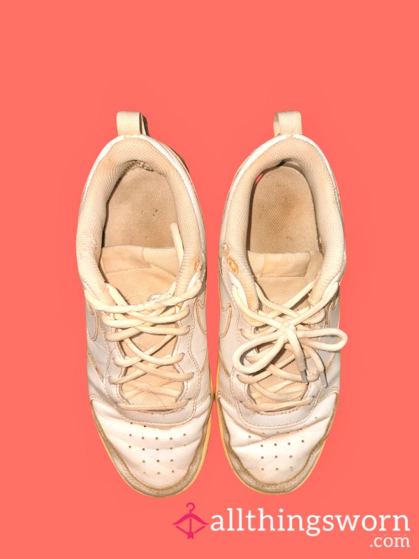 Very Old Well Worn White Sneaker Shoes