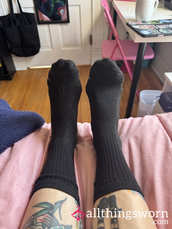 Very Well Worn Black Socks With Holes