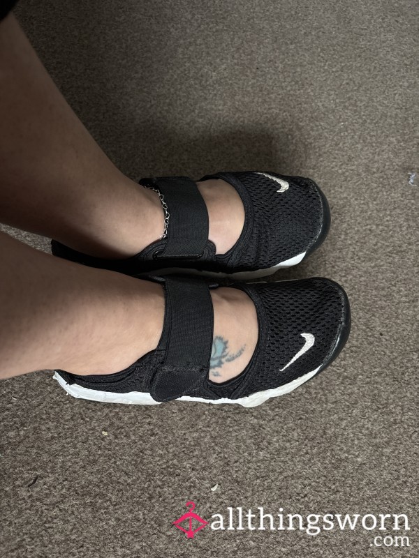 Very Well Worn Nike Trainers