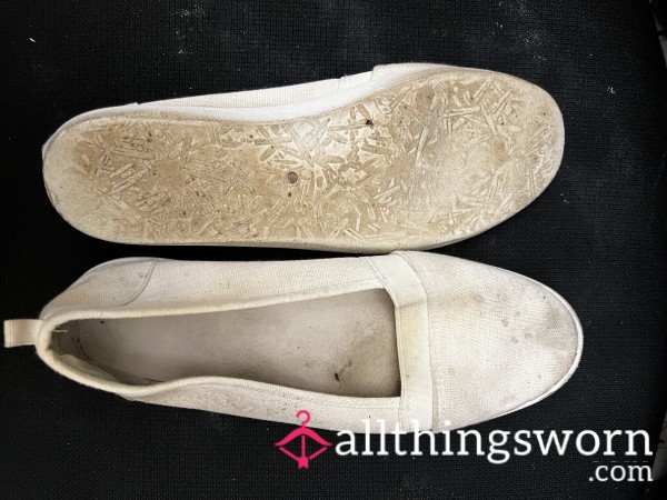 Very Well Worn Very Dirty White Shoes