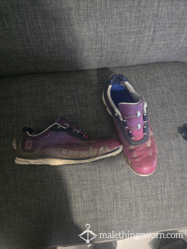 Very Worn And Smelly Golf Shoes